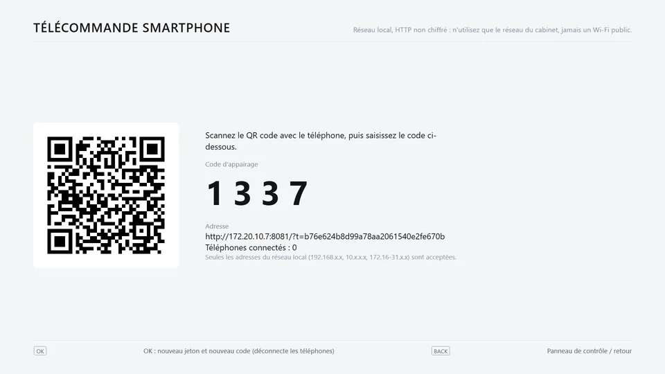 Écran pour la télécommande smartphone : QR code, code d'appairage à 4 chiffres et adresse.